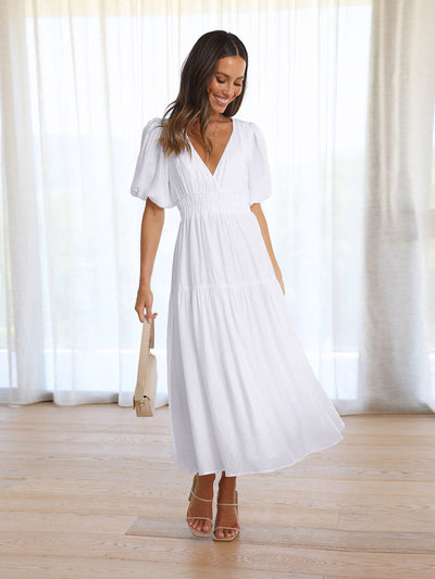 Sophisticated women's dress with contemporary puff sleeves