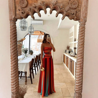 Elegant long party dress with a flowing cut and strapless gradient effect