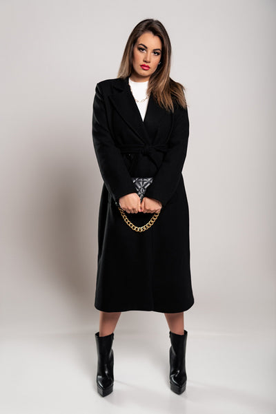 Elegant women's long coat with button closure and sophisticated design