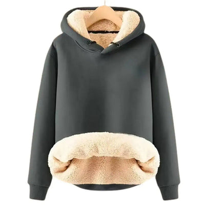 Warm women's coat with deep hood and long sleeves, ideal for cold days