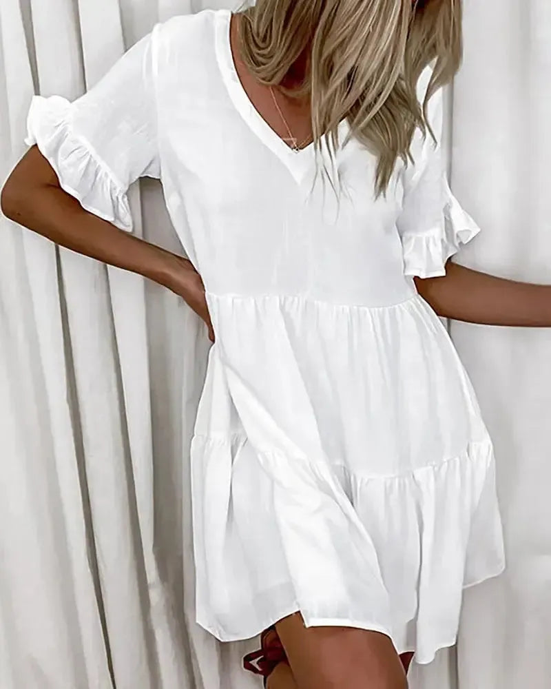 Abigail - Simple casual dress with a V-neck and ruffled hem
