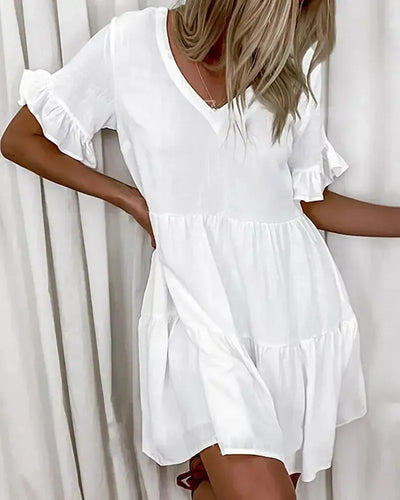 Abigail - Simple casual dress with a V-neck and ruffled hem