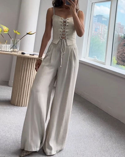 Two-piece set with a thin strap knotted top and flowing straight-leg pants
