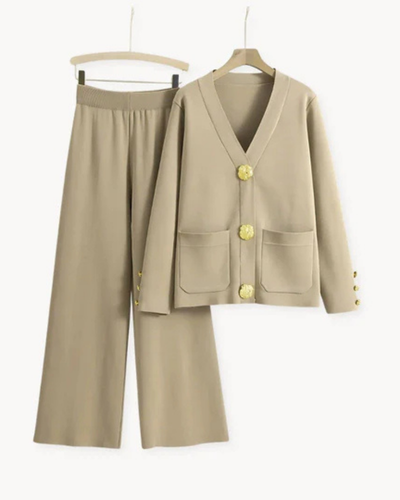 Elegant feminine ensemble with a large-buttoned jacket and wide-legged trousers