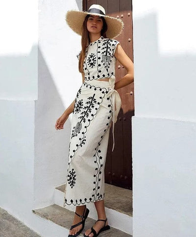 Printed sleeveless top and flowing skirt set, ideal for casual events