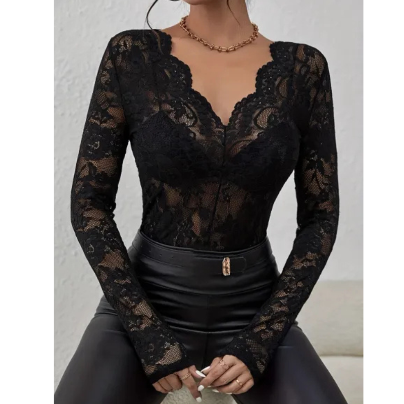 Elegant women's blouse with long sleeves and openwork details
