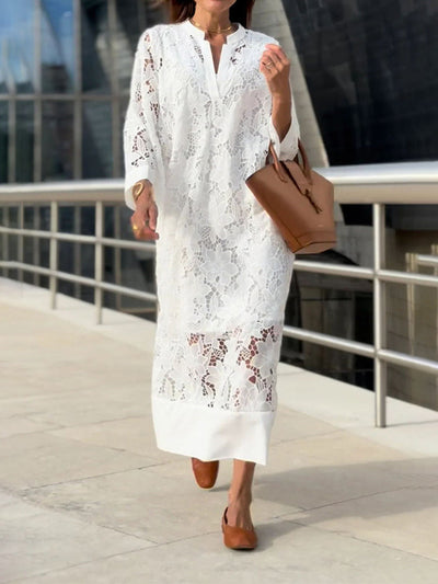 Elegant long dress with long sleeves and a loose fit for special events