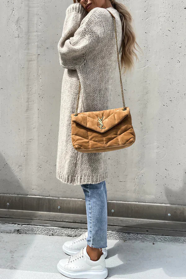 Elegant cardigan with long sleeves and a deep V-neckline for a sophisticated style