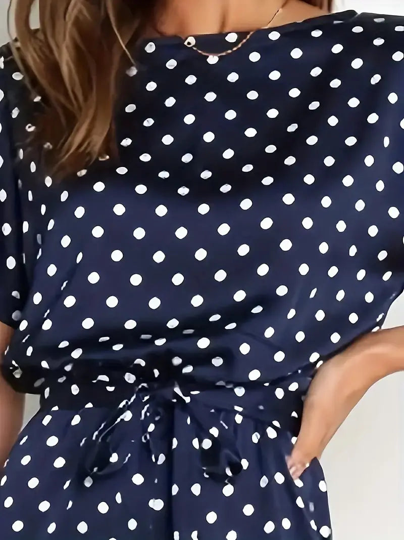 Women's long jumpsuit with elegant design and polka dot print