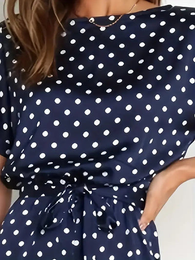 Women's long jumpsuit with elegant design and polka dot print
