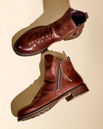 Classic and stylish men's boots with unique zipper design