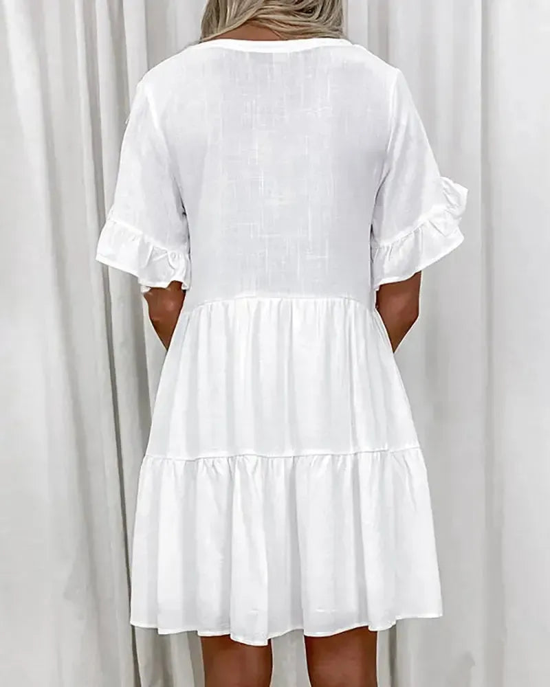 Abigail - Simple casual dress with a V-neck and ruffled hem