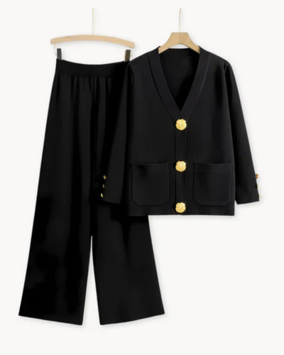 Elegant feminine ensemble with a large-buttoned jacket and wide-legged trousers