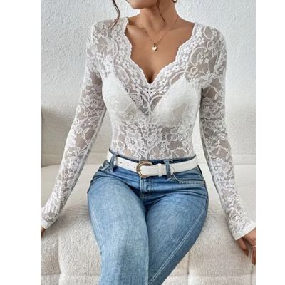 Elegant women's blouse with long sleeves and openwork details