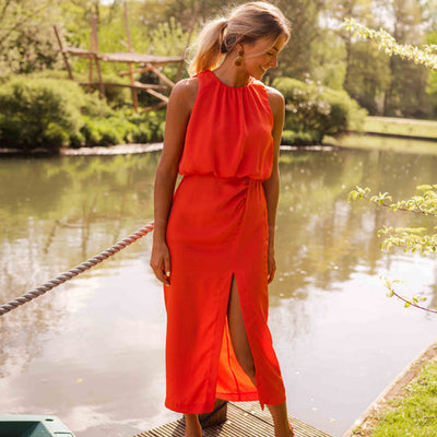 Sleeveless midi dress with a high neckline for a sophisticated look