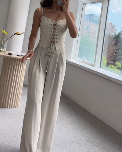 Two-piece set with a thin strap knotted top and flowing straight-leg pants