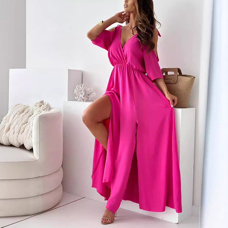 Elegant long dress with a crossover neckline and flowing side slit