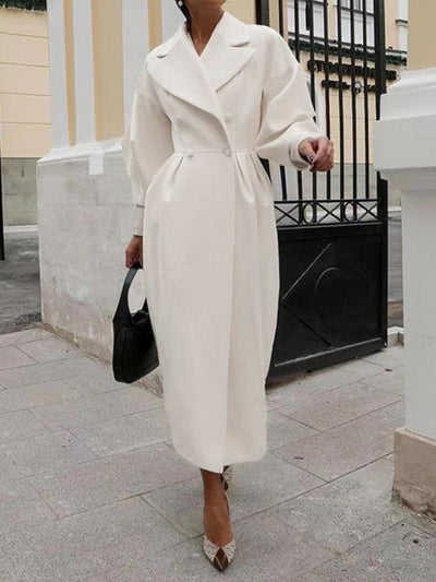 Subtle style with lantern sleeves and wide lapels