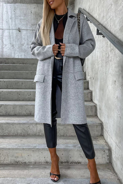 Elegant coat with pockets and a turn-down collar: the perfect style for any occasion