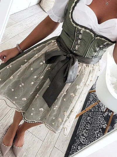 Elegant Tyrolean dress with lace, V-neck and short sleeves
