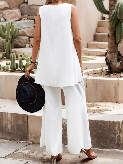 Elegant summer set for women with wide short-sleeved blouse and wide-leg pants