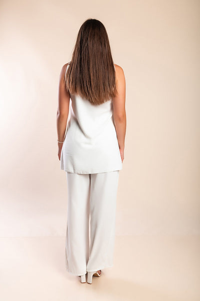 Elegant summer set for women with wide short-sleeved blouse and wide-leg pants