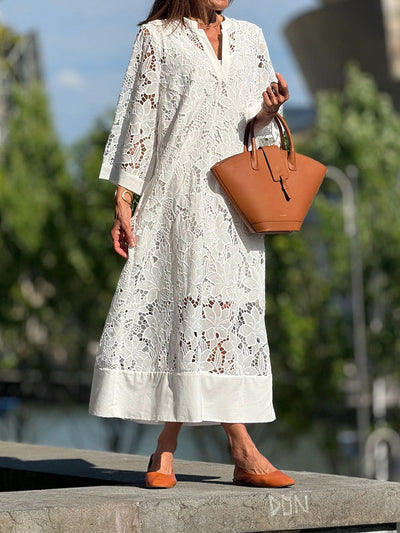 Elegant long dress with long sleeves and a loose fit for special events