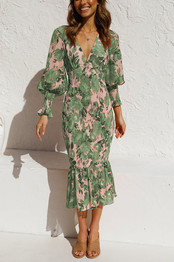 Midi dress with a gathered waist and floral design, ideal for events and special occasions