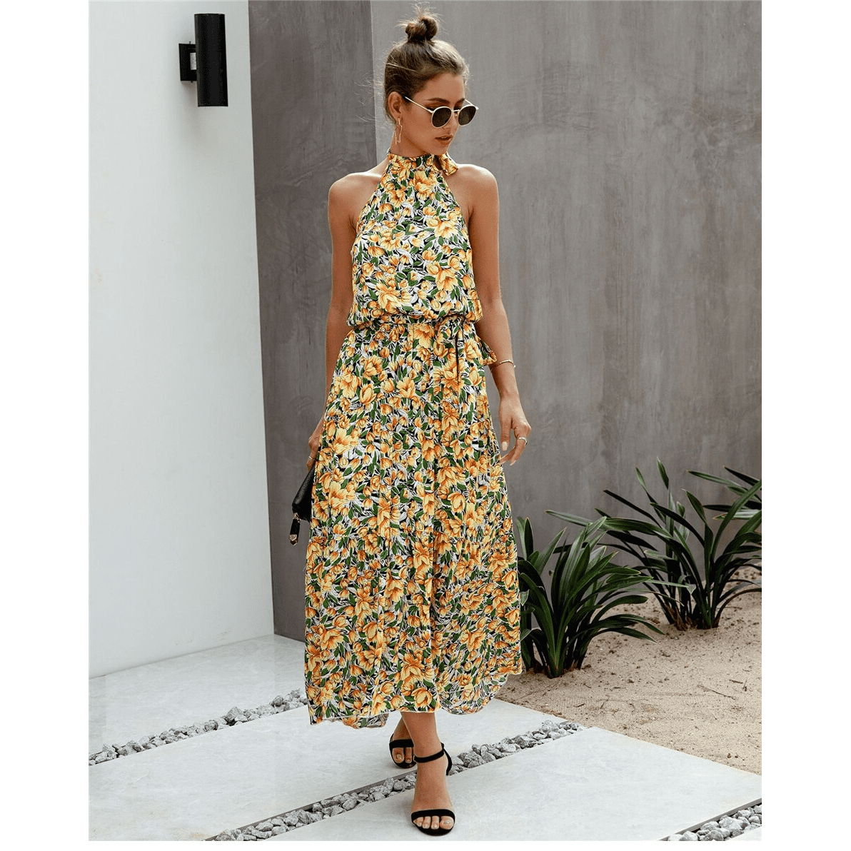 Boho-style long dress with floral print and halter neck