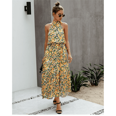 Boho-style long dress with floral print and halter neck