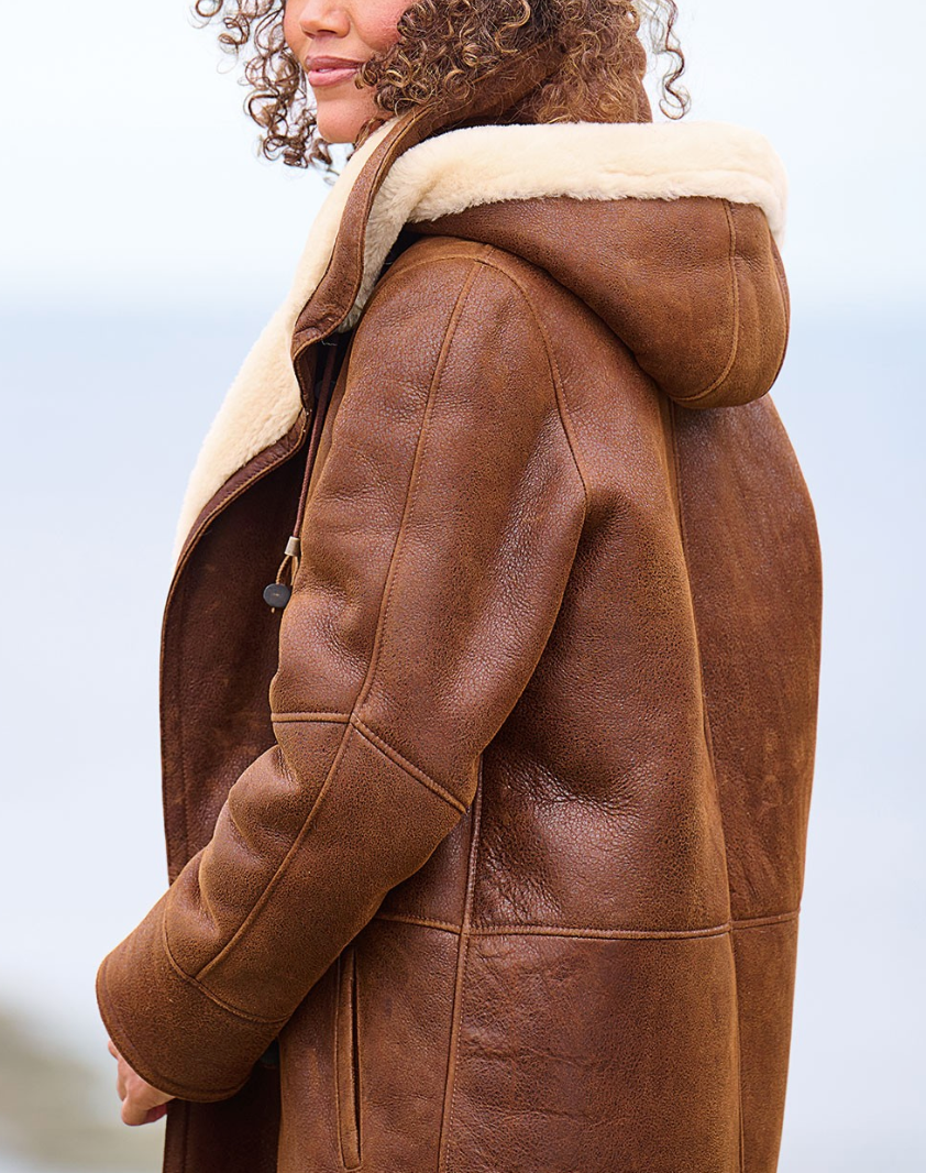 Women's long coat with modern design and hood