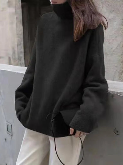 Elegant oversized sweater with long sleeves and a high neck