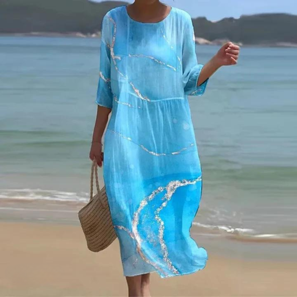 Long summer dress with a modern print and short sleeves