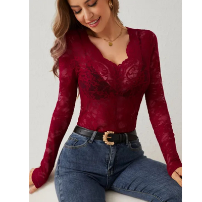 Elegant women's blouse with long sleeves and openwork details