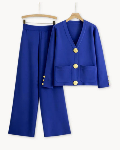 Elegant feminine ensemble with a large-buttoned jacket and wide-legged trousers