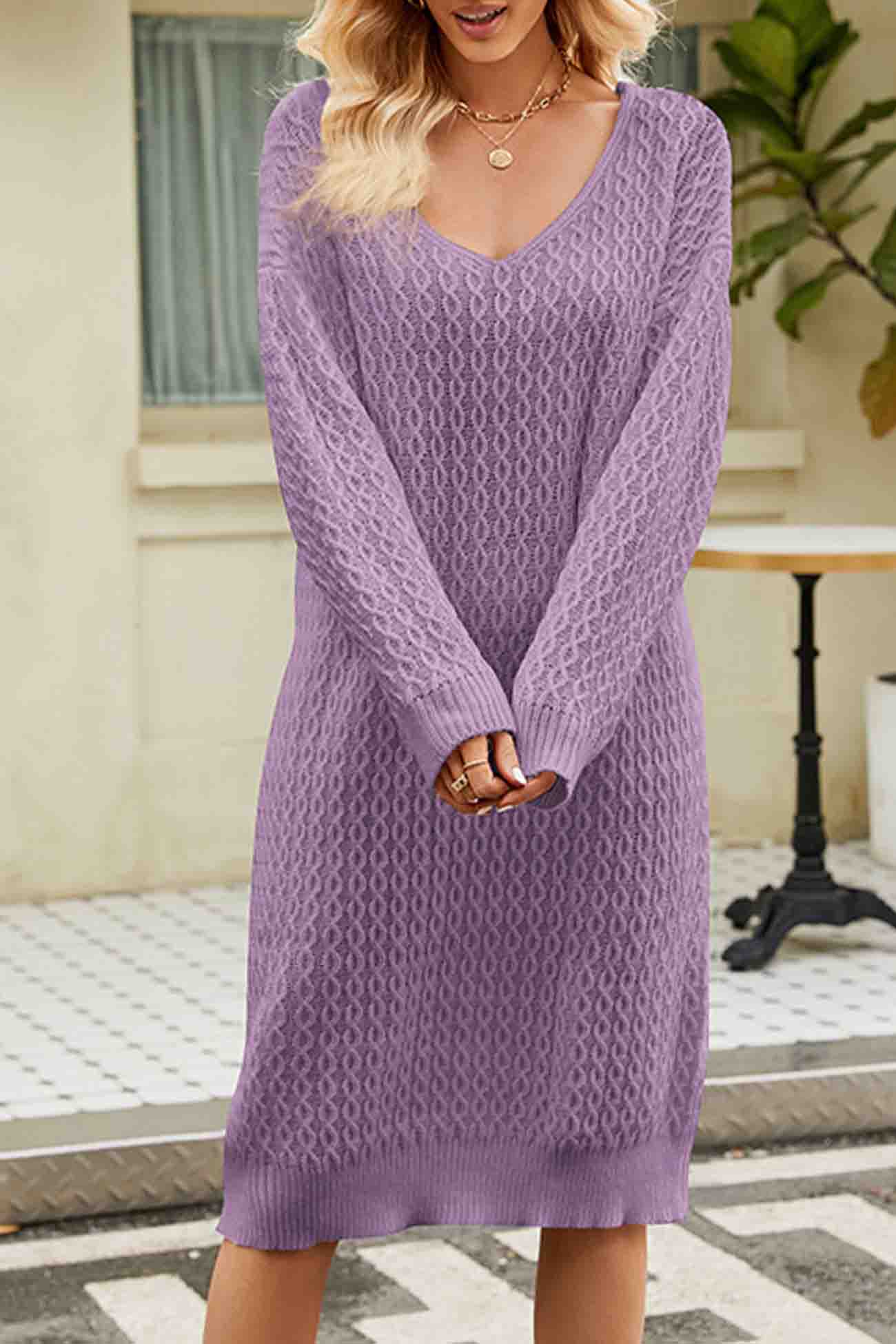Elegant sweater dress with a deep V-neckline for sophisticated looks