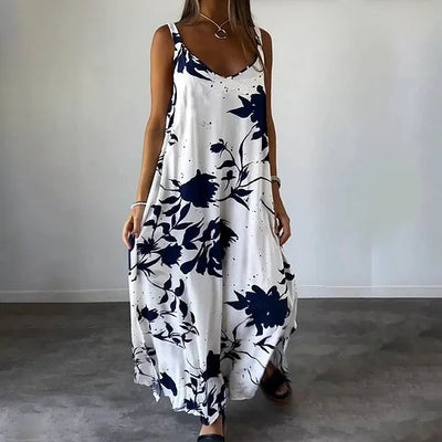 Long sleeveless dress with floral print, ideal for sunny days