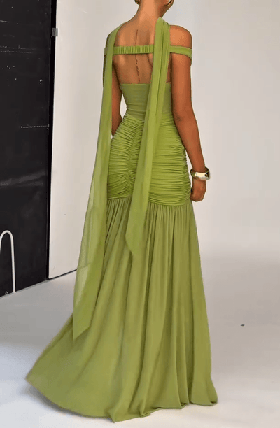 Elegant long dress with straps and pleated detail for special events