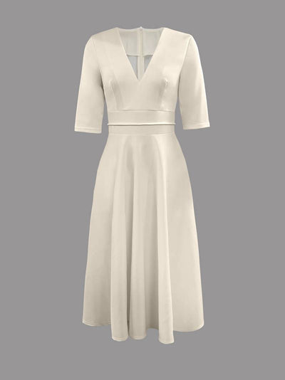 Elegant midi party dress with medium sleeves and flared cut