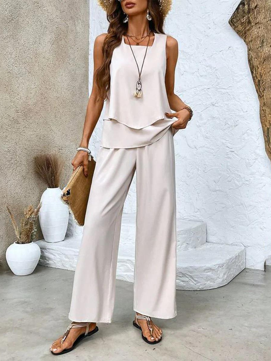 Elegant summer set for women with a sleeveless blouse and wide-legged pants