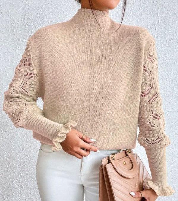 Elegant apricot sweater with sophisticated printed sleeves