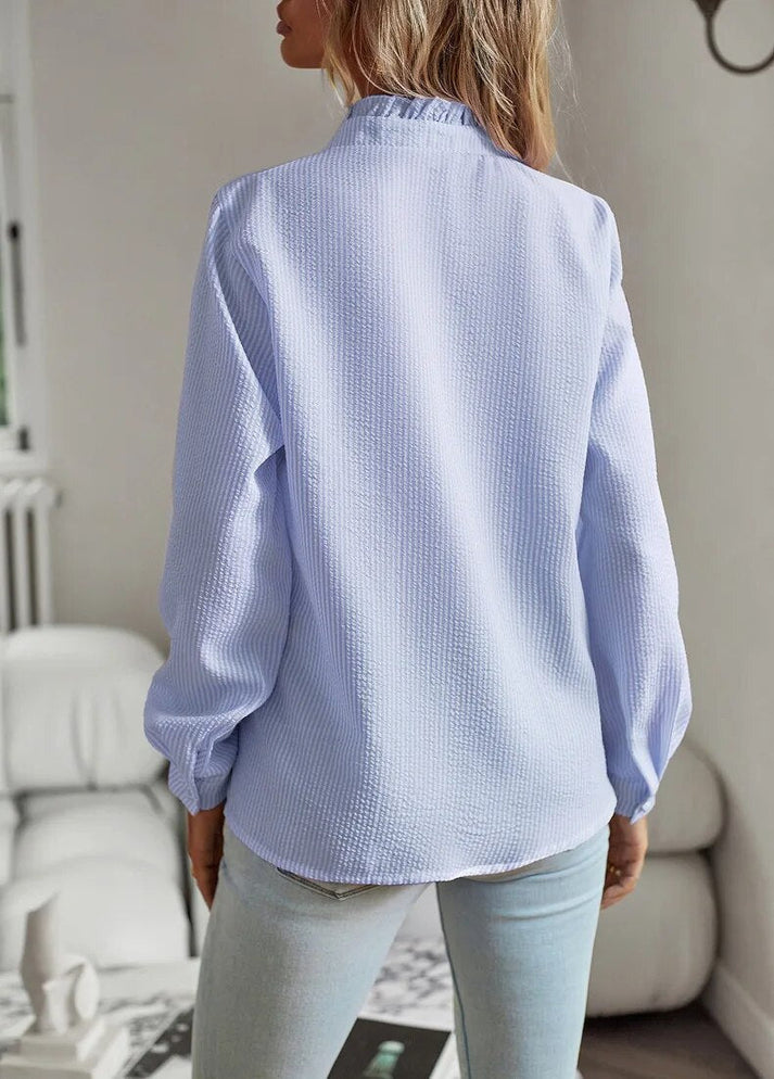 Elegant and versatile blouse perfect for any occasion