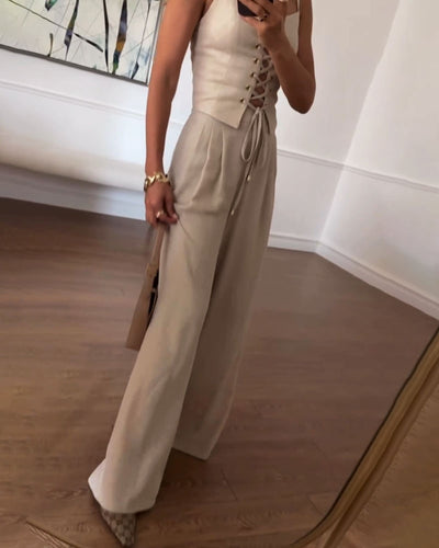 Two-piece set with a thin strap knotted top and flowing straight-leg pants