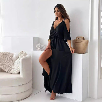 Elegant long dress with a crossover neckline and flowing side slit