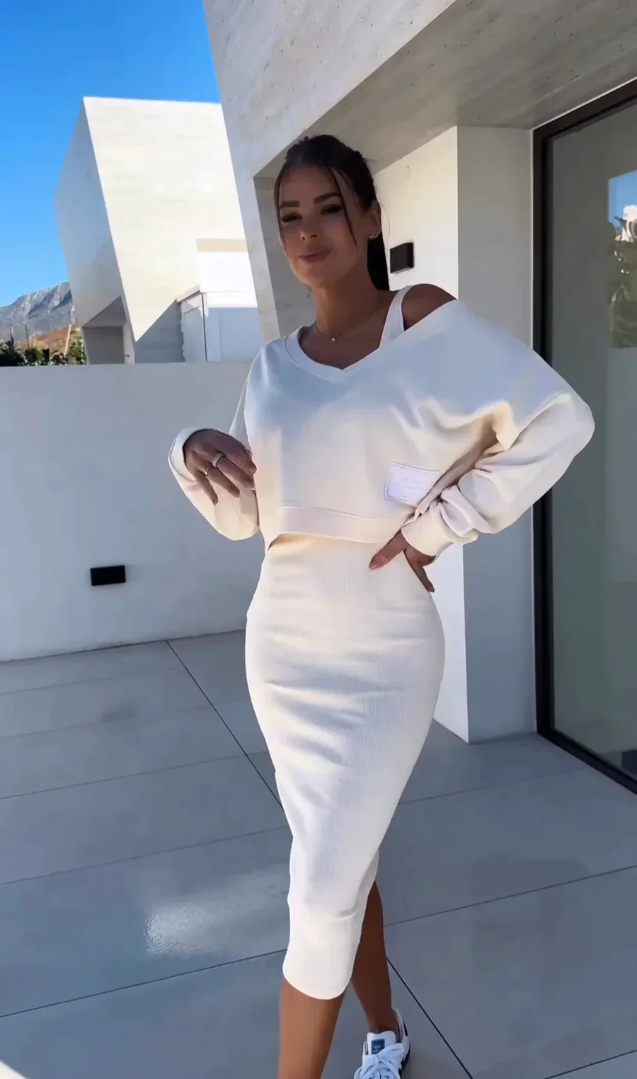 Outfit: Bodycon dress and sweater for a stylish look