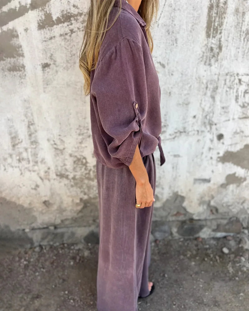 Light summer outfit with a long-sleeved button-down shirt and wide-legged pants