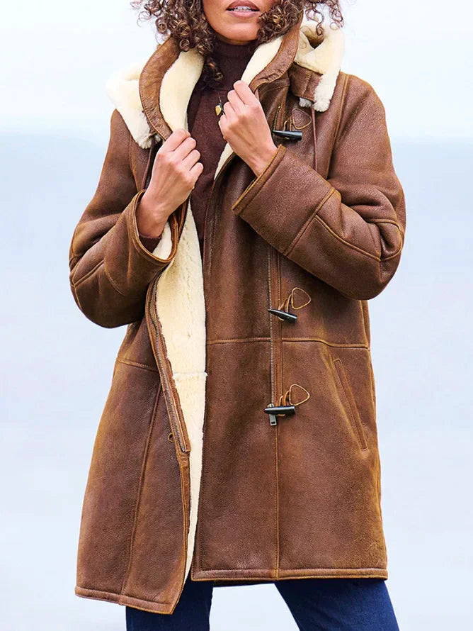 Women's long coat with modern design and hood