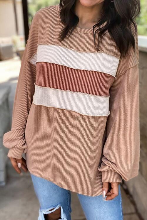 Elegant Women's Blouse with Original Design and Stylish Sleeves