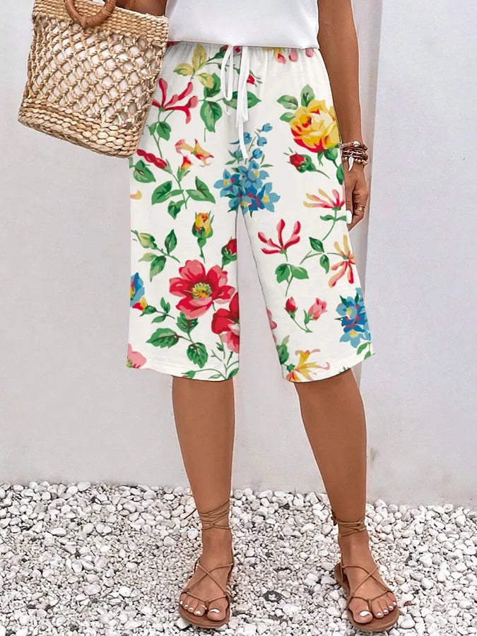 Emma - Women's relaxed, loose-fitting trousers with drawstrings in a floral and botanical print