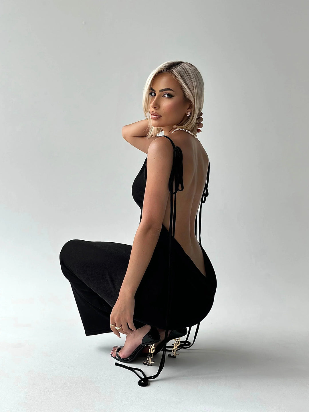 Elegant long evening dress with open back